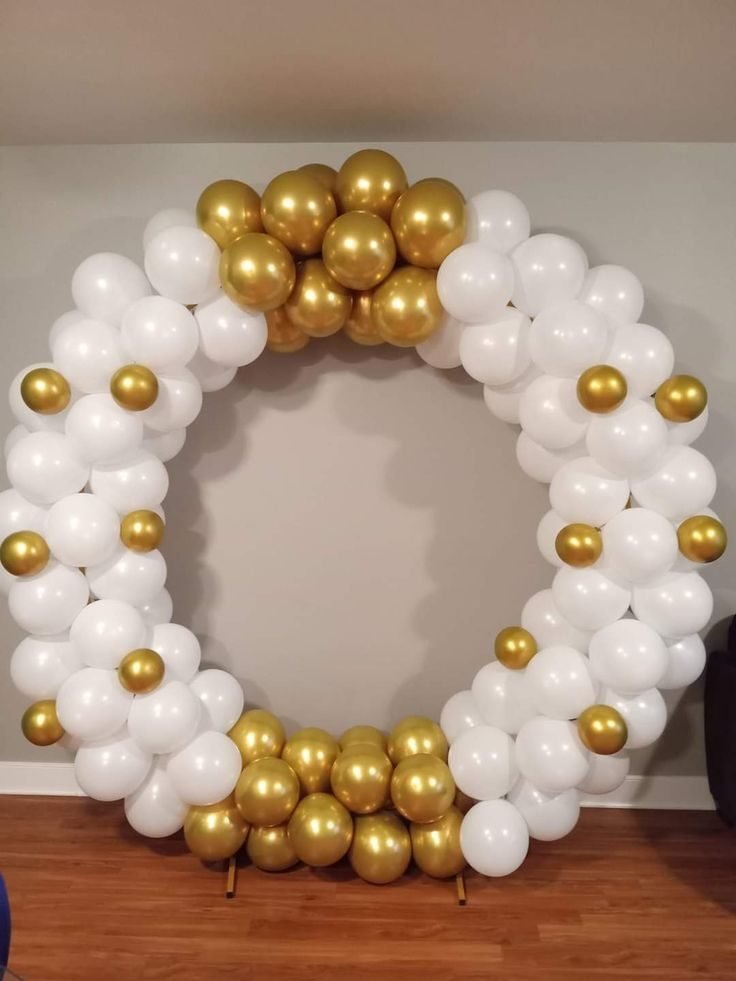 White and gold balloon ring for company events