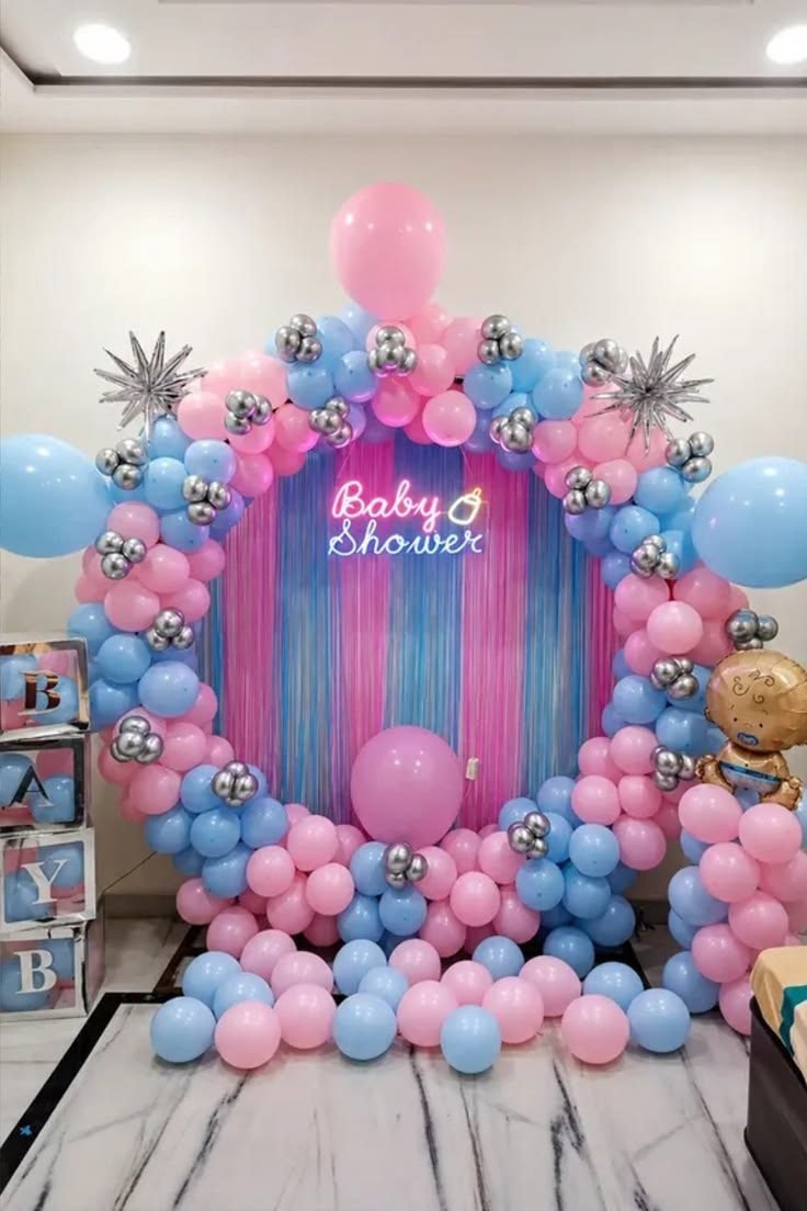 Baby shower balloon ring decoration in pink and blue